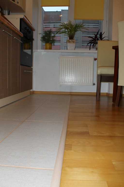 Тёплый пол на кухне под плитку: особенности, преимущества и недостатки, монтаж, фото