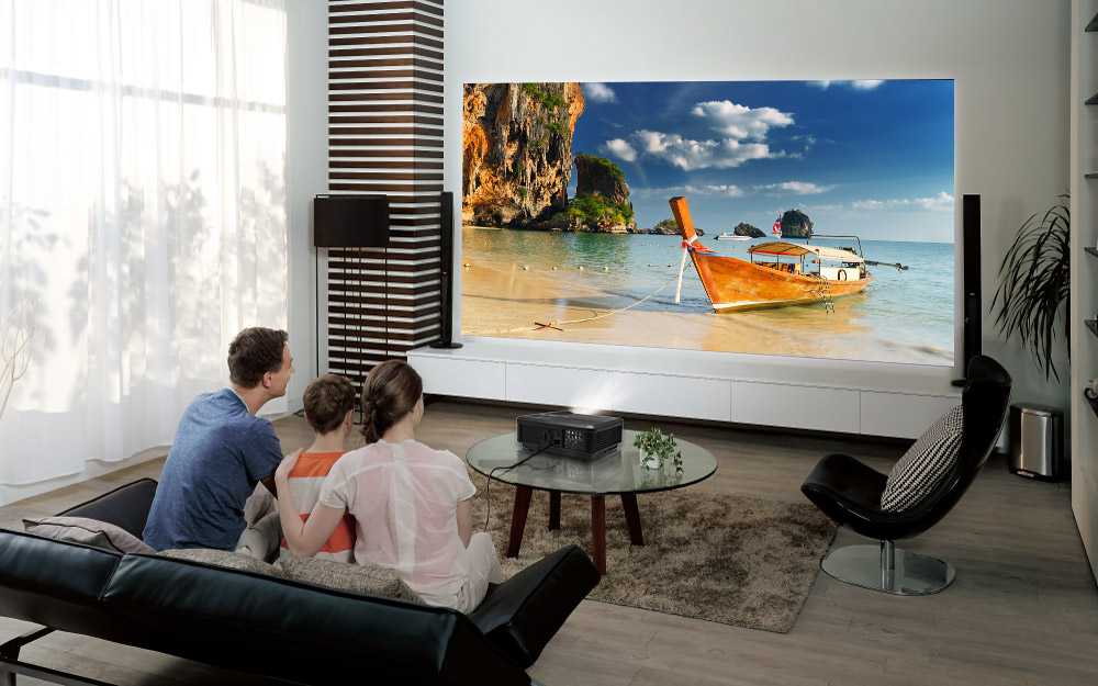 Надо телевизора. Телевизор Эмеральд 75 дюймов. Samsung 65 дюймов в комнате. Телевизор 75 дюймов в квартире. Лучшие телевизоры 65 дюймов 2021.